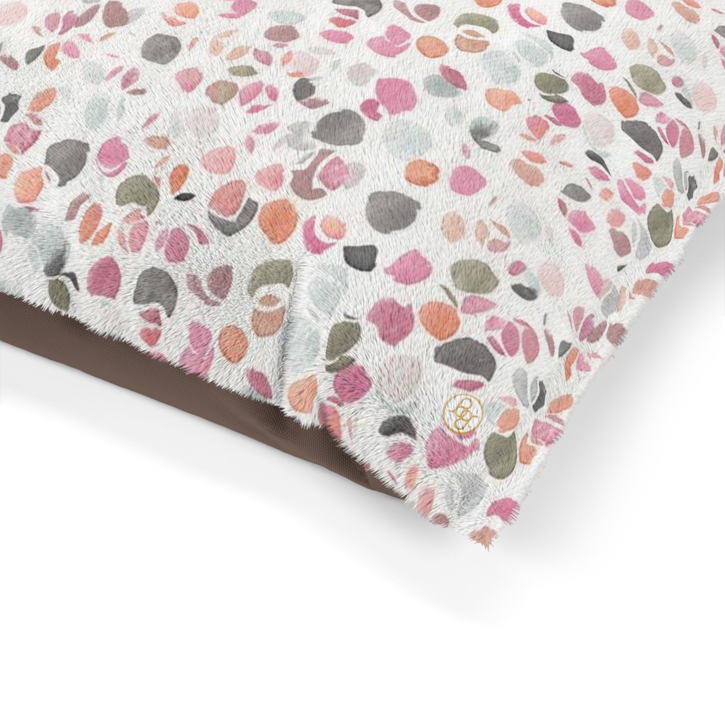 Fleece dog bed featuring an abstract floral pattern in shades of pink