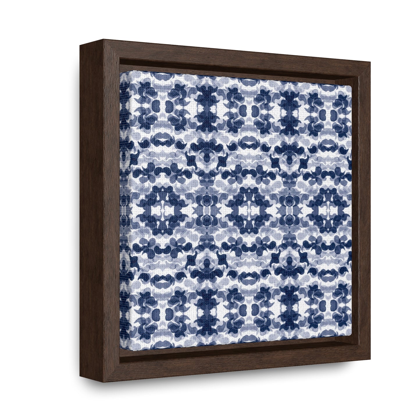 Smalled framed canvas featuring a navy blue paisley pattern