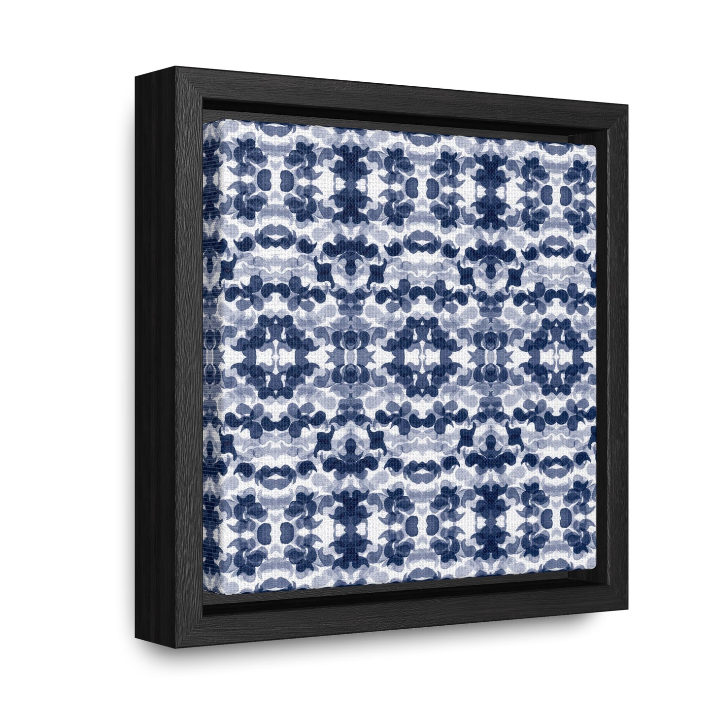 Smalled framed canvas featuring a navy blue paisley pattern