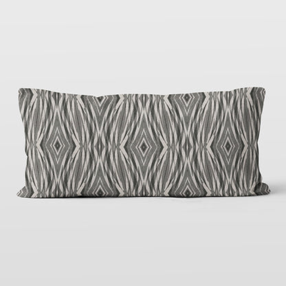 Rectangular lumbar pillow featuring linocut pattern in grey and neutral tones.
