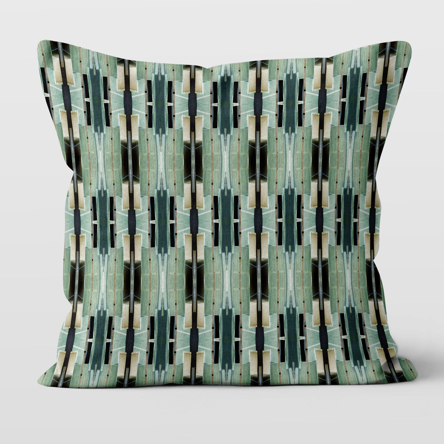 Throw pillow featuring an abstract geometric green pattern