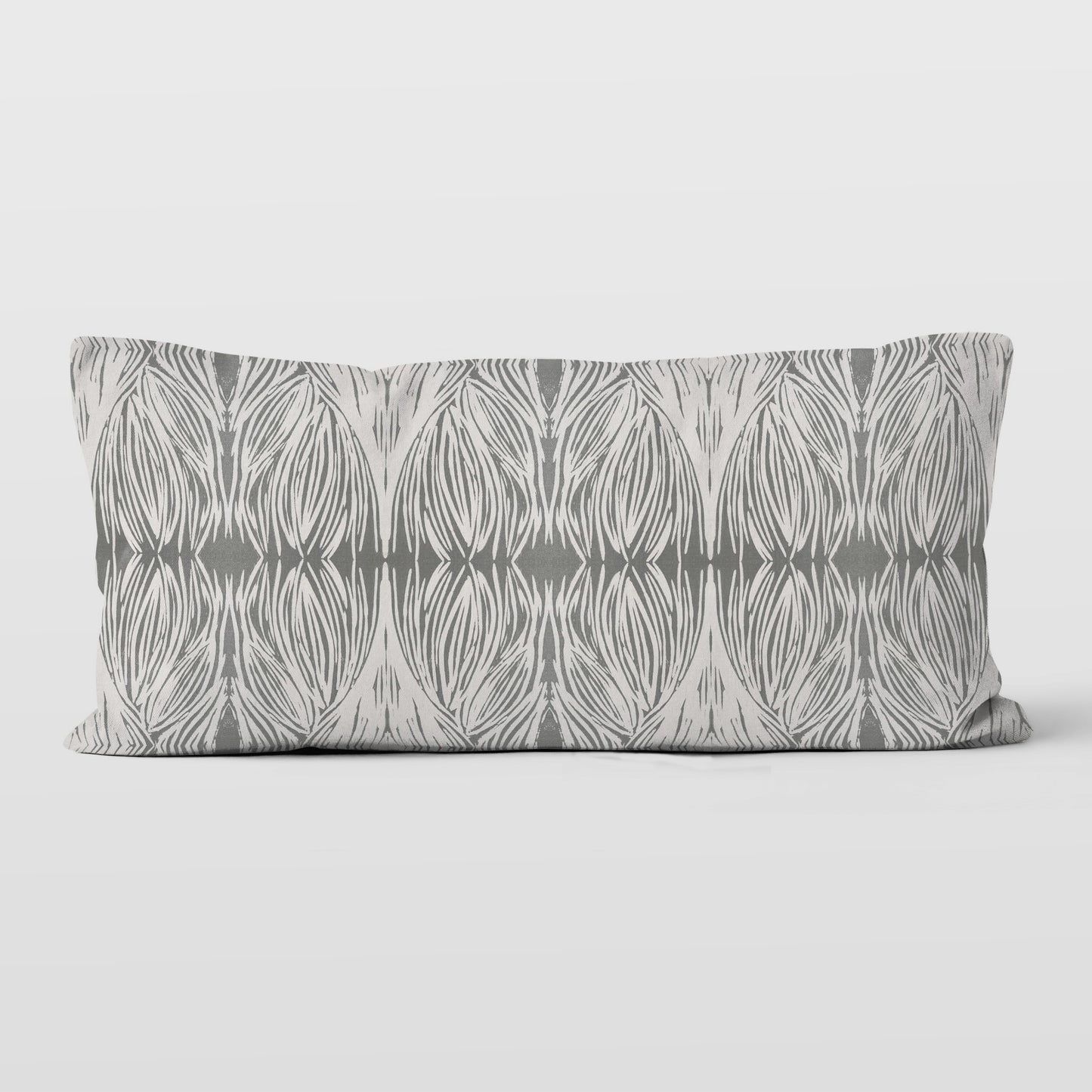 Rectangular lumbar pillow featuring an abstract linocut pattern in grey tones.