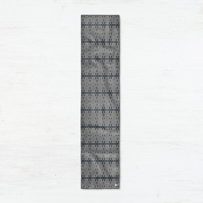 Rectangular silk scarf featuring a gray abstract pattern