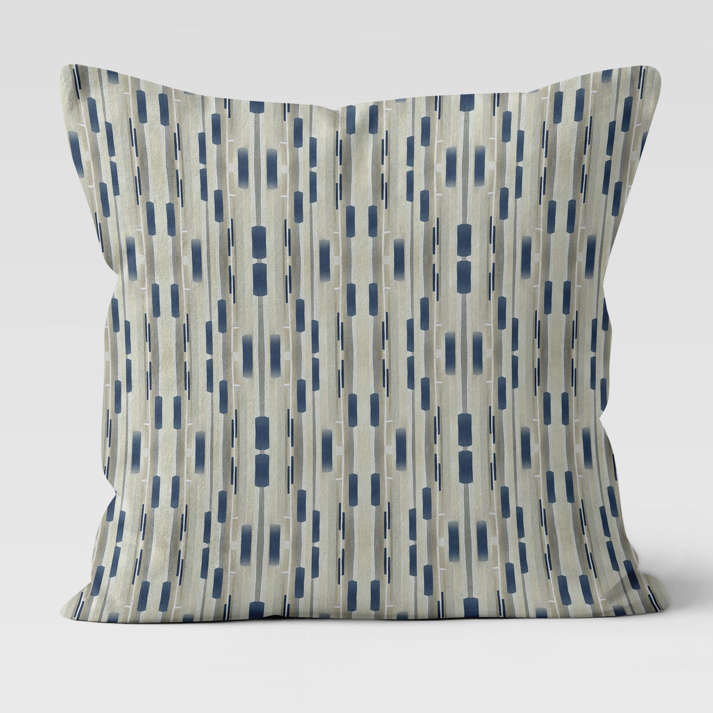 Square throw pillow featuring a tan and navy blue abstract stripe pattern