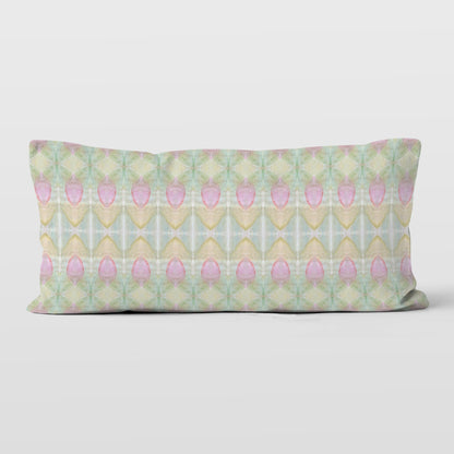Rectangular pillow featuring a hand-painted abstract rosebud pattern.