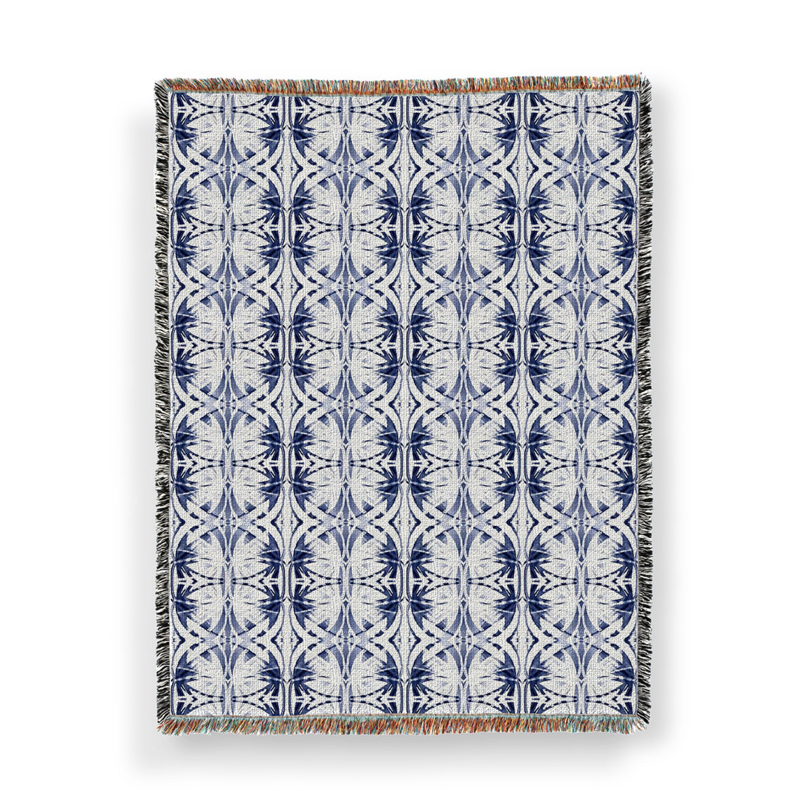 Woven throw blanket featuring an abstract blue and white pattern