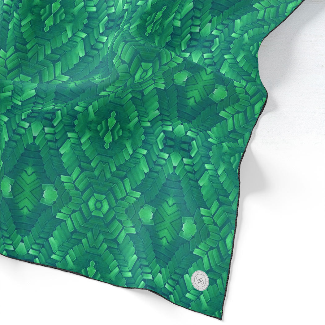Hand painted pattern on silk scarf in emerald green