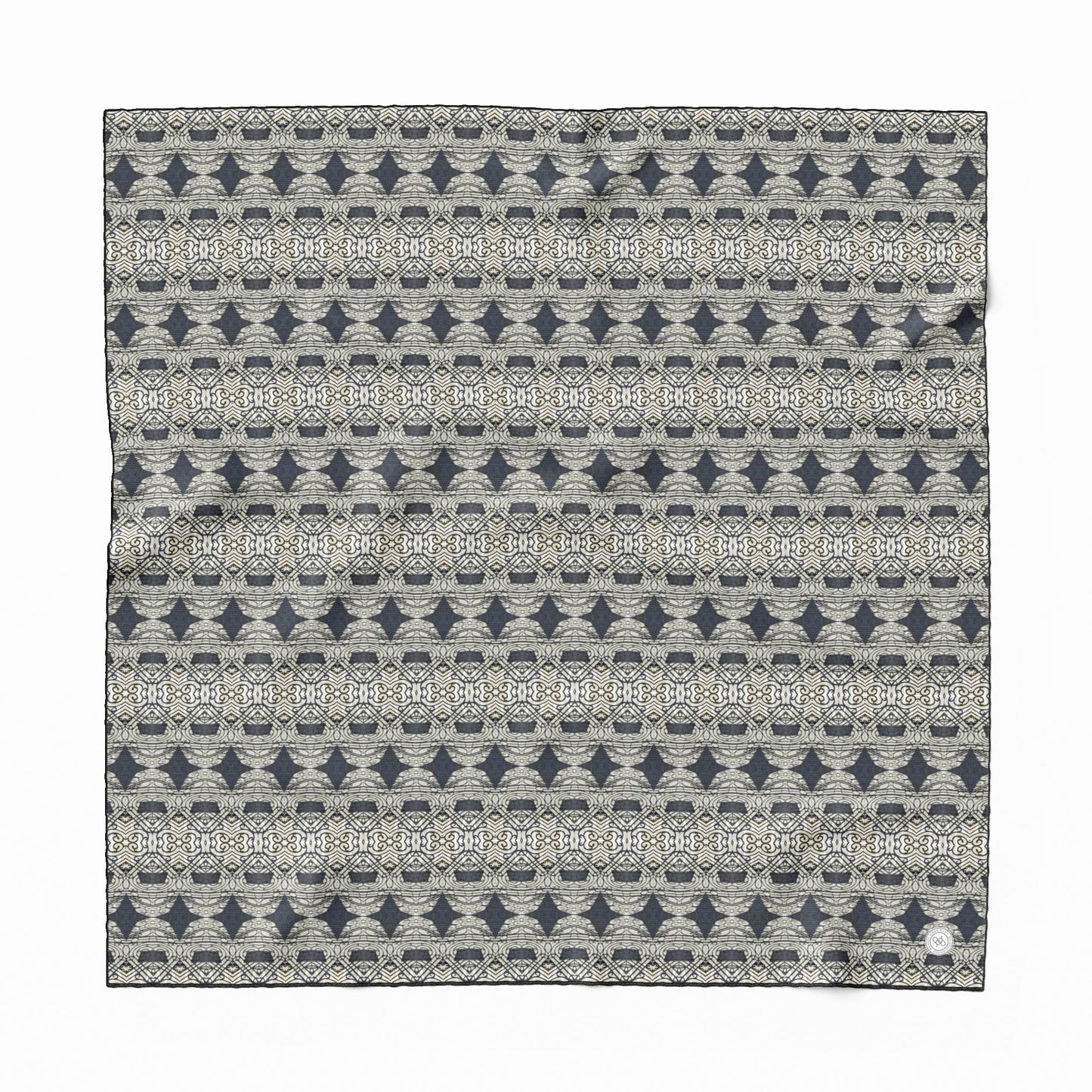 Silk scarf featuring an abstract geometric pattern in gray and black.