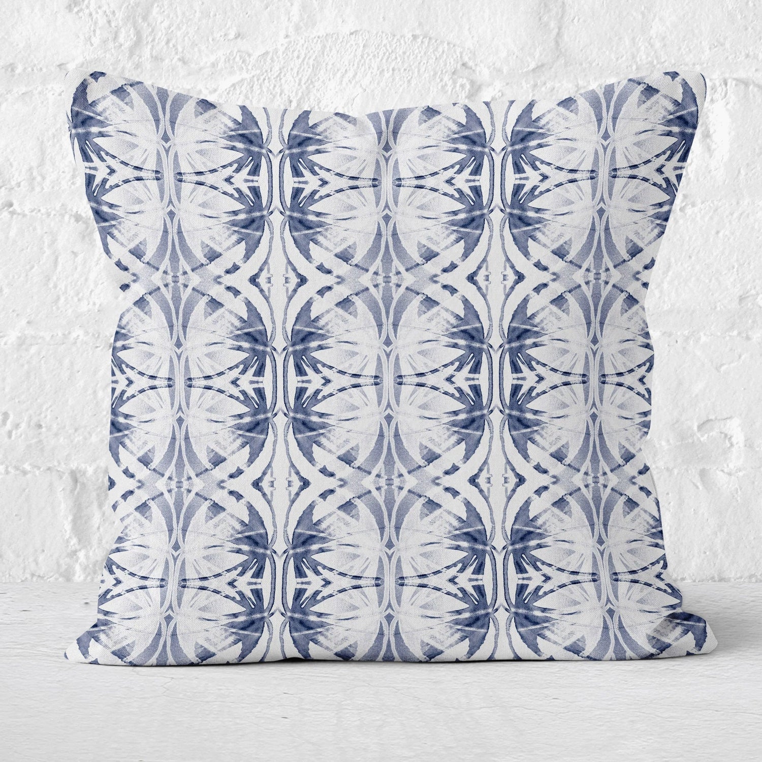 Square throw pillow featuring a hand-painted abstract pattern in bright green.