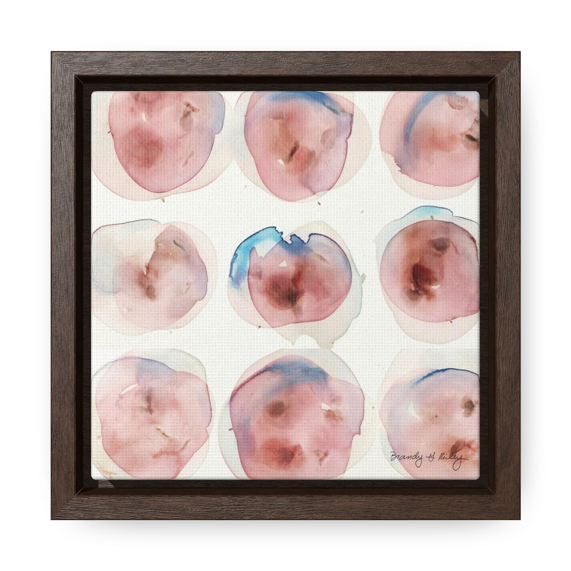Abstract painting with pink and blue abstract circles in a brown frame.