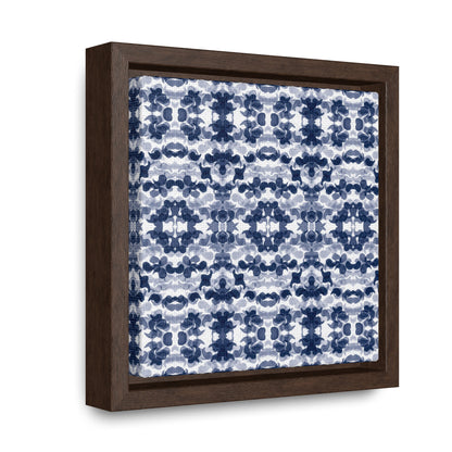 Smalled framed canvas featuring a navy blue paisley pattern