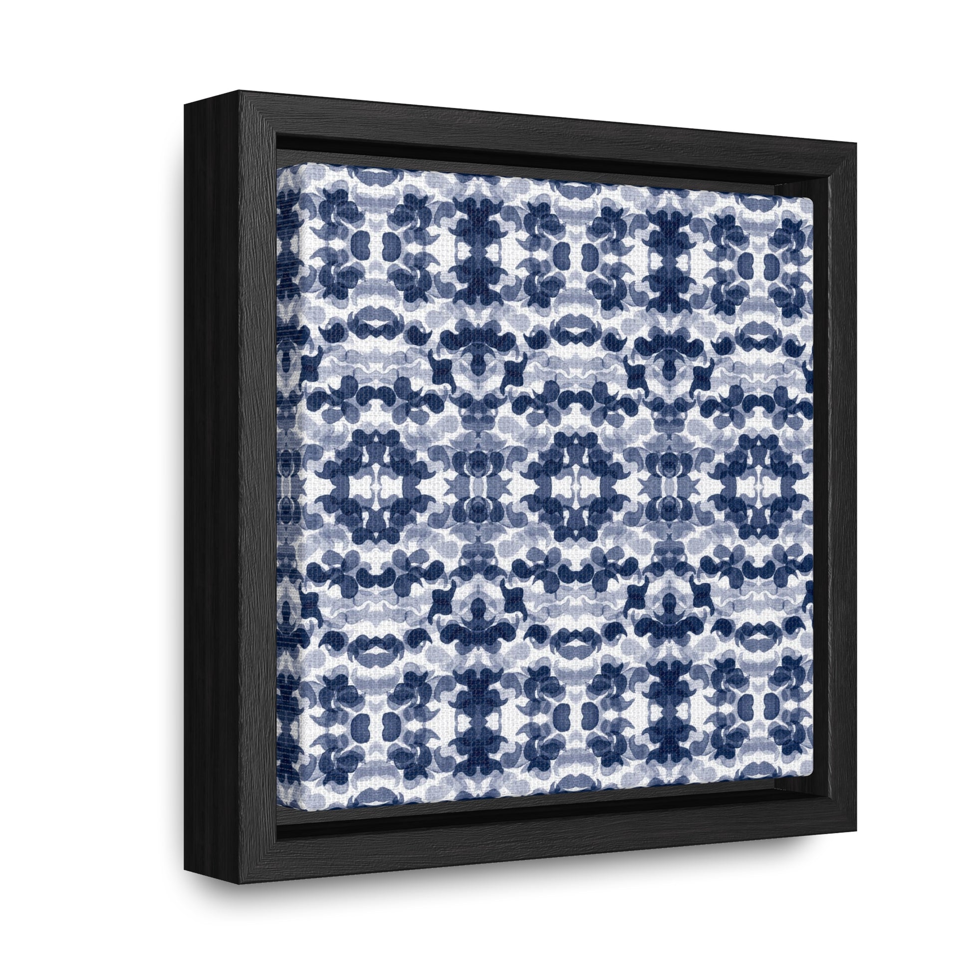 Smalled framed canvas featuring a navy blue paisley pattern