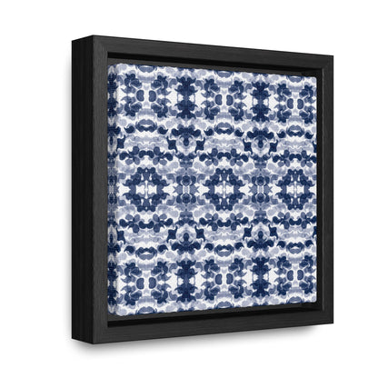 Smalled framed canvas featuring a navy blue paisley pattern