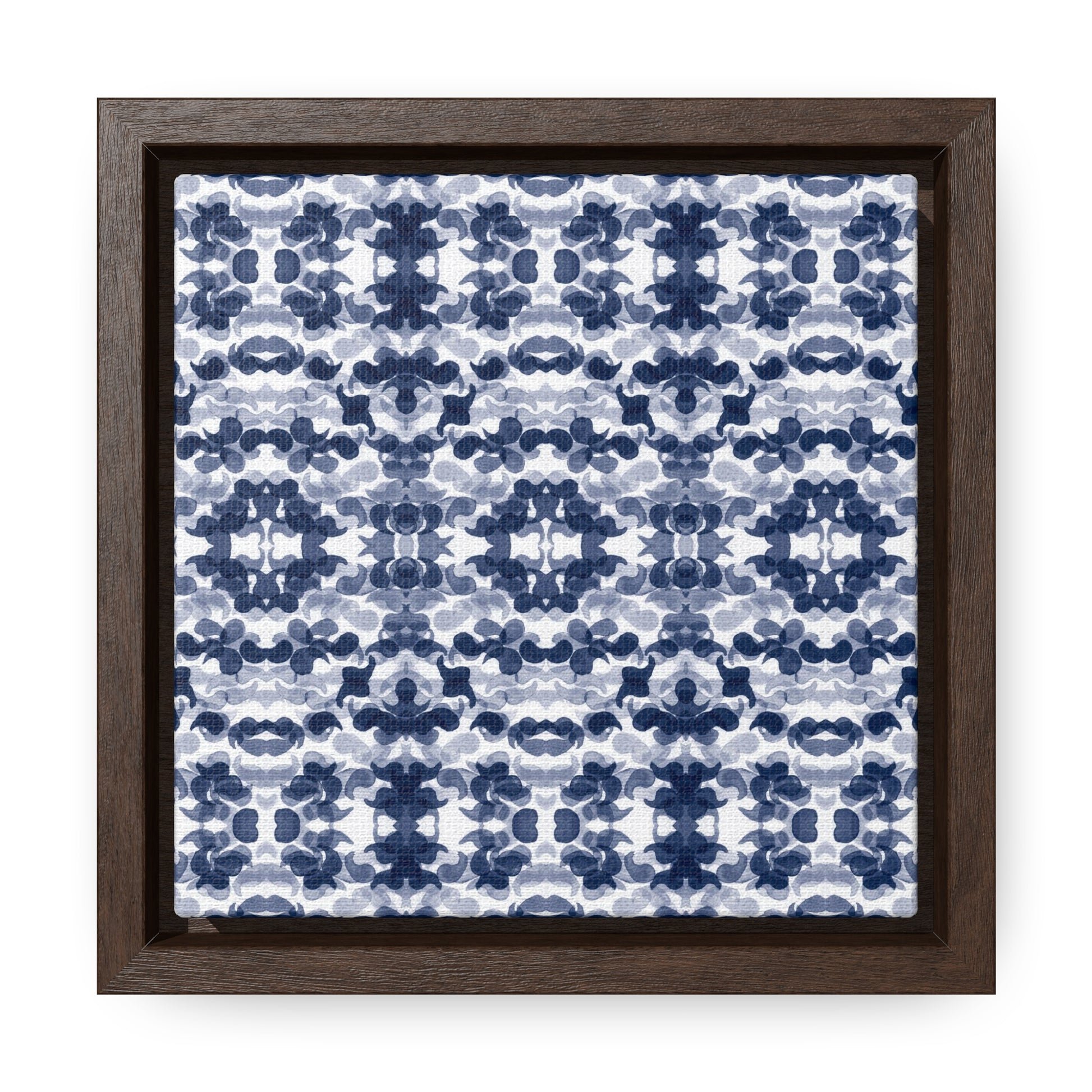 Smalled framed canvas featuring a navy blue paisley pattern