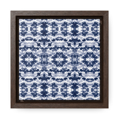 Smalled framed canvas featuring a navy blue paisley pattern