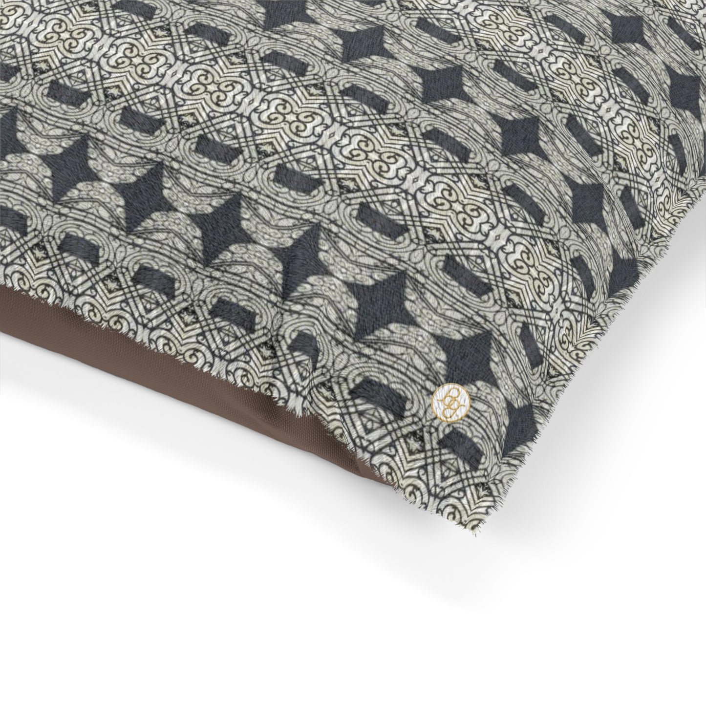 Detail view of a Fleece dog bed featuring a black and gray abstract pattern