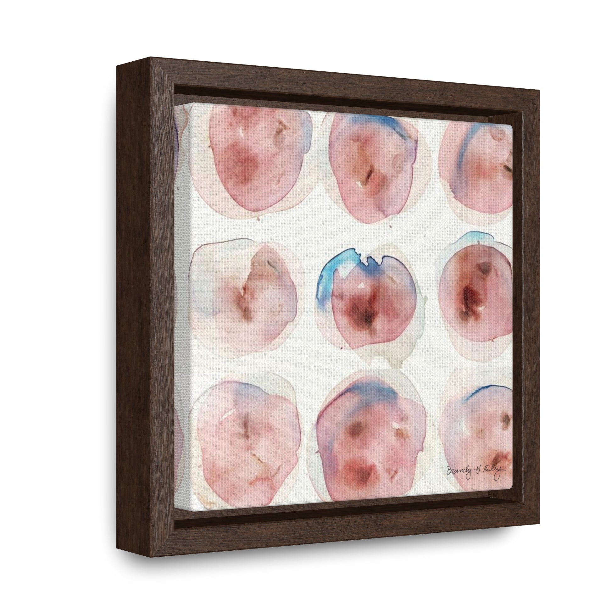 Abstract painting with pink and blue abstract circles in a brown frame.