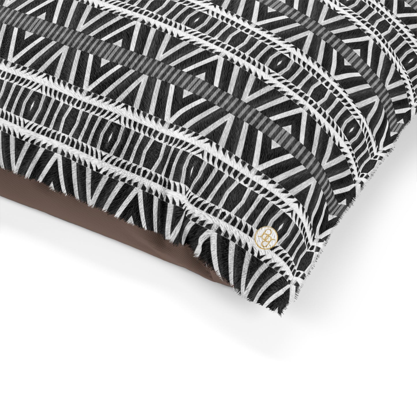 Fleece dog bed featuring an abstract black and white pattern