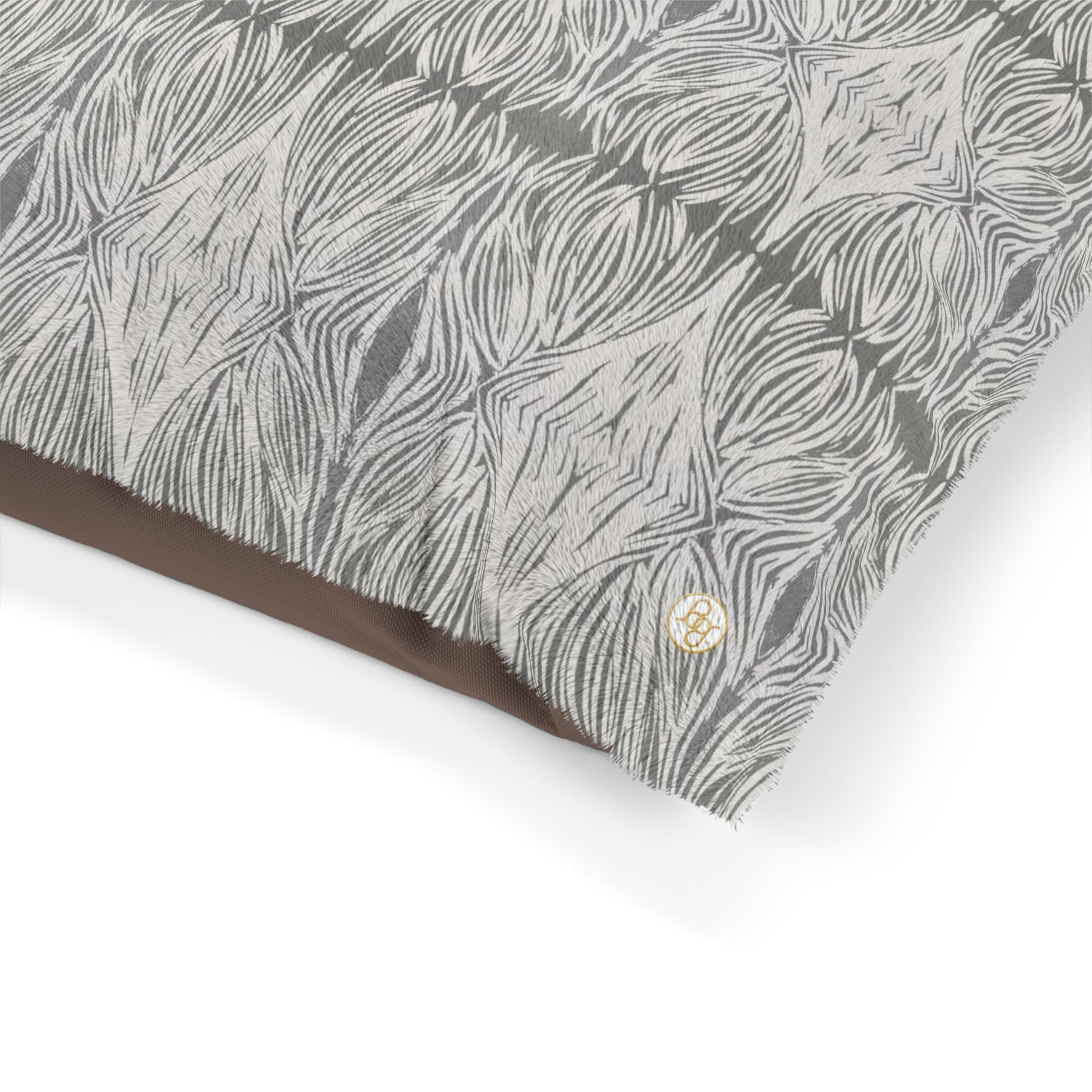 Close-up of a Fleece dog pillow featuring a grey abstract pattern
