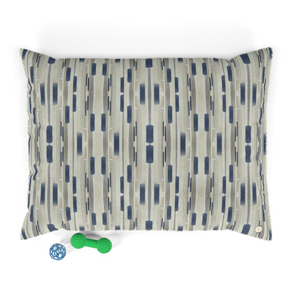 Fleece dog bed featuring a collaged stripe pattern in khaki and navy blue