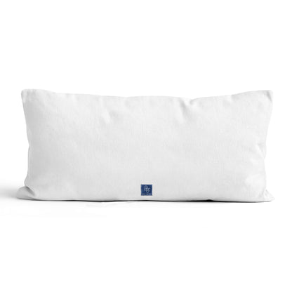 Solid white back of pillow with navy blue label