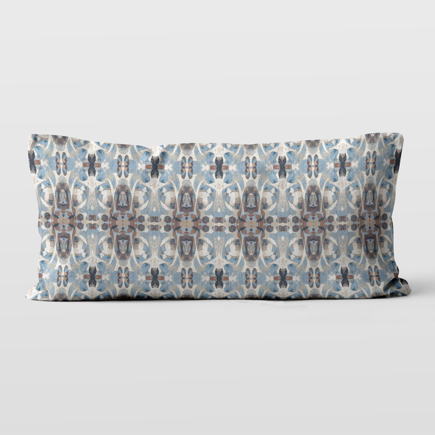 12 x 24 lumbar pillow featuring an abstract hand-painted blue and brown pattern.