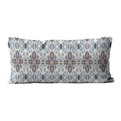 12 x 24 lumbar pillow featuring an abstract hand-painted blue and brown pattern.