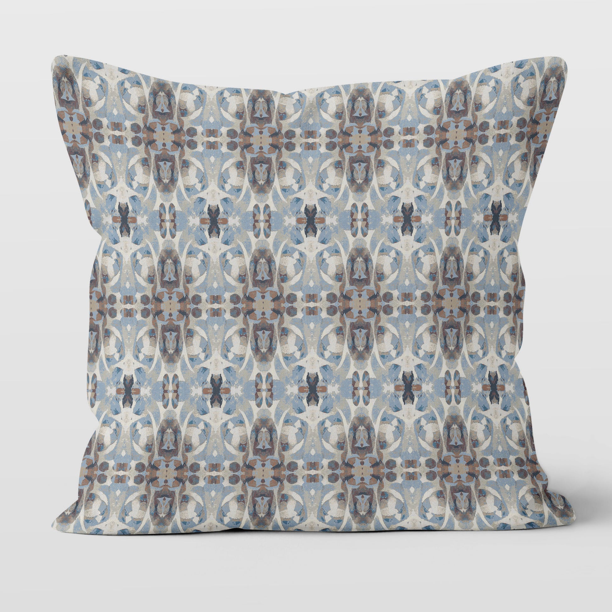 Square throw pillow featuring a blue and brown abstract painted pattern