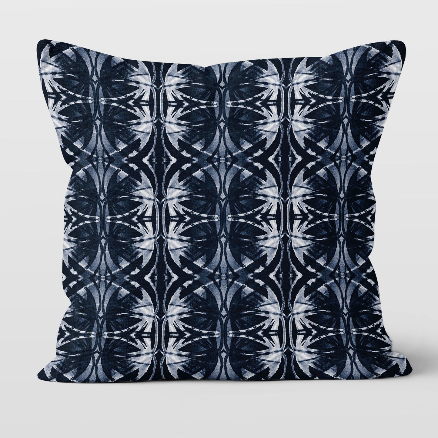 Square throw pillow featuring a dark blue and white abstract pattern
