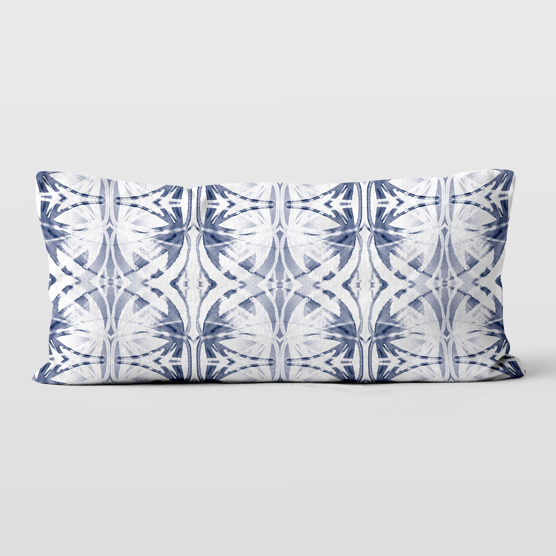 Rectangular pillow featuring abstract painted pattern in light blue and white.