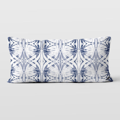 Rectangular pillow featuring abstract painted pattern in light blue and white.