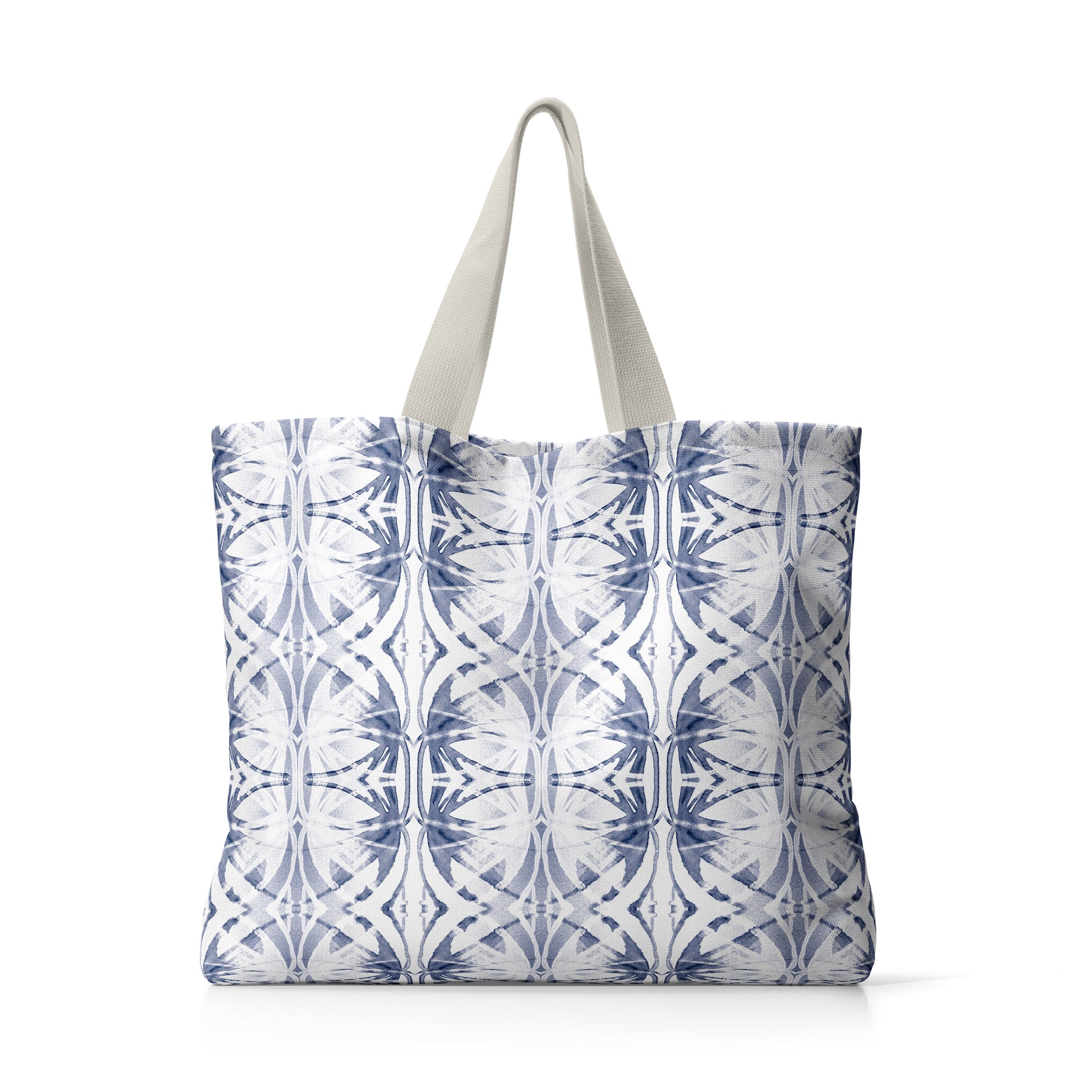 Oversized canvas tote on white background, featuring a blue and white abstract pattern