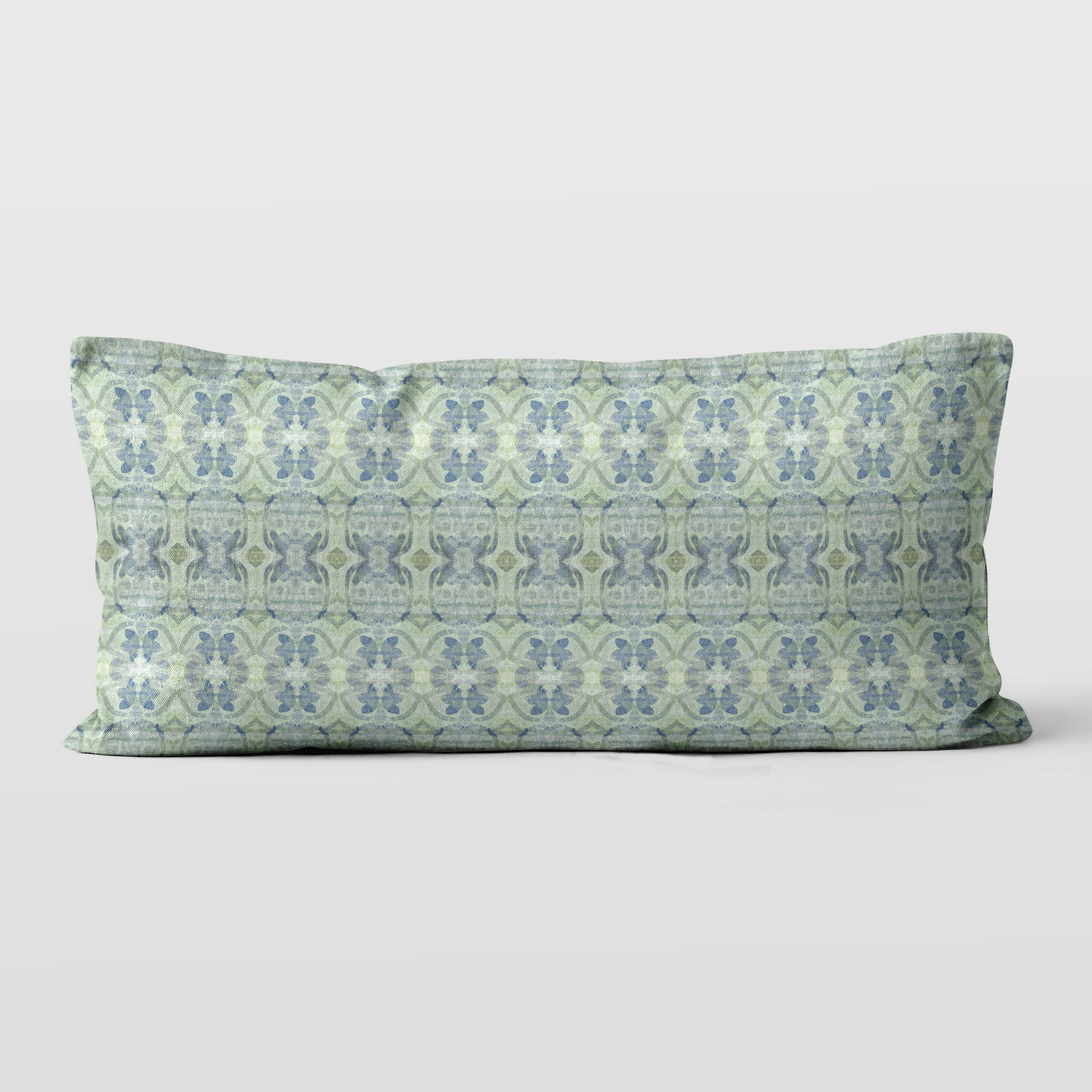 Lumbar pillow featuring an abstract blue and green floral pattern