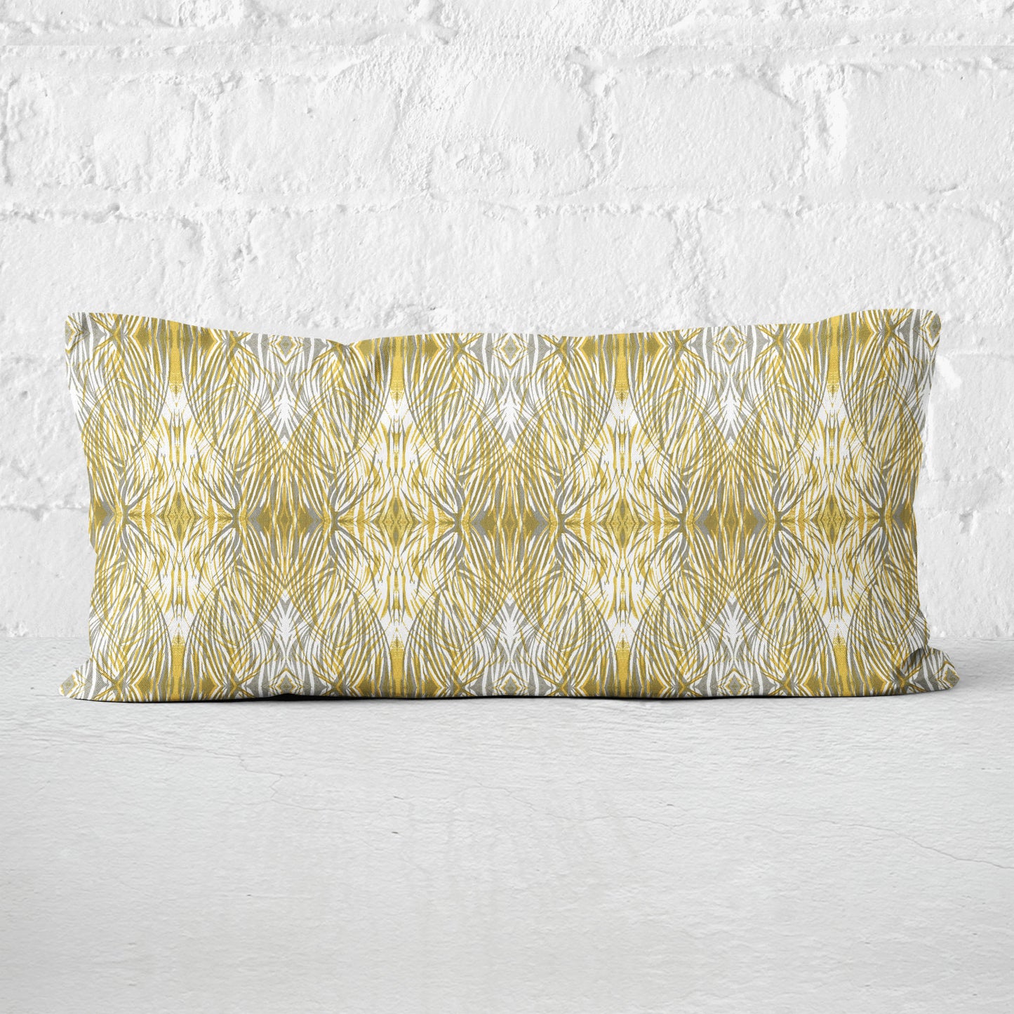 12 x 24 lumbar pillow featuring a gold and gray abstract linocut pattern.