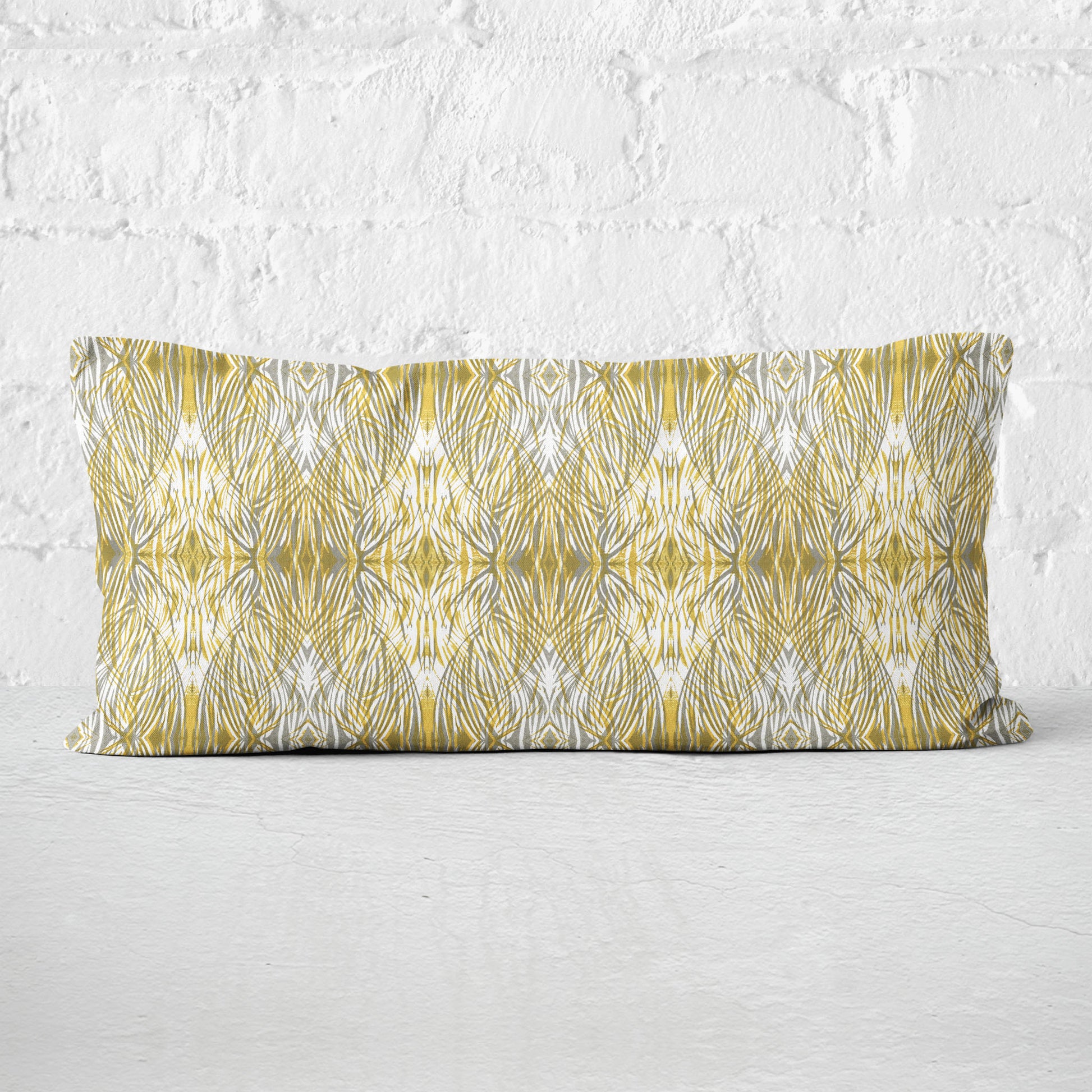 12 x 24 lumbar pillow featuring a gold and gray abstract linocut pattern.