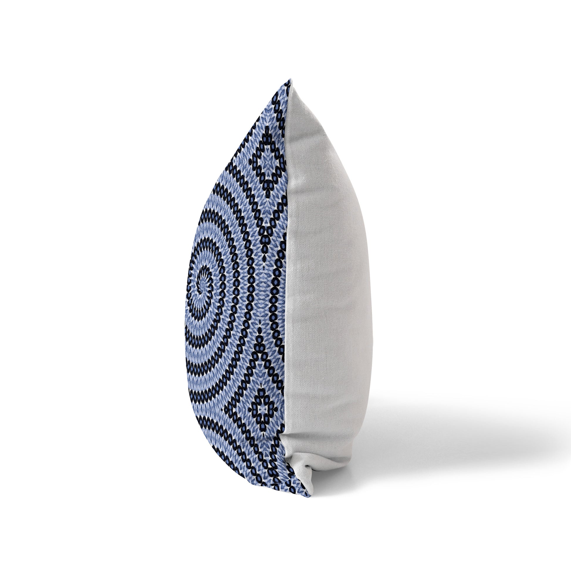 Side view of a pillow featuring a blue spiral pattern and solid white back