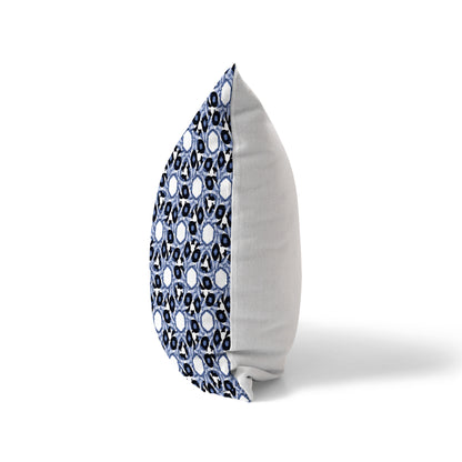 Side view of a pillow featuring an abstract blue and white pattern and a solid white back