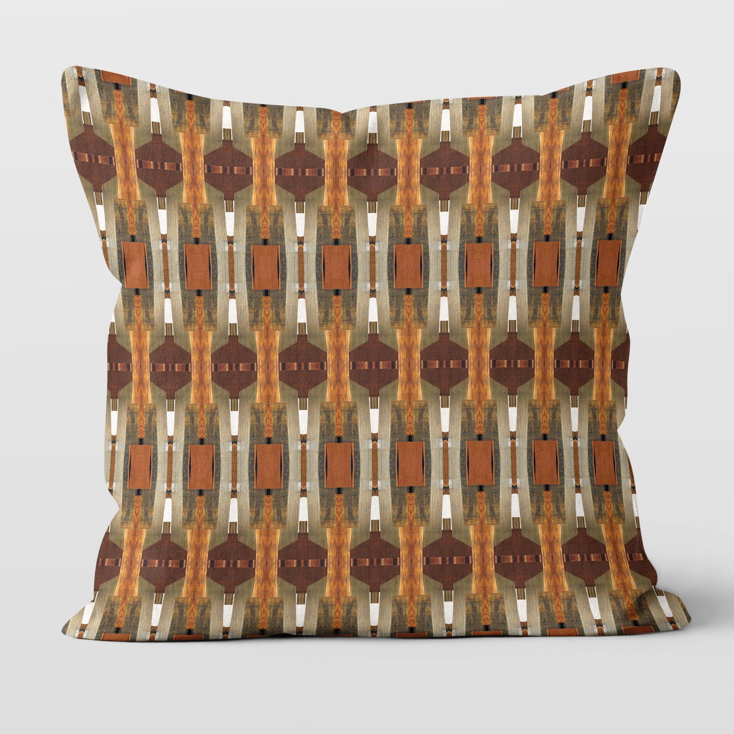 Throw pillow featuring collage pattern in wood and warm tones.