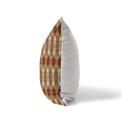 Side view of a pillow featuring an abstract brown pattern and solid white back