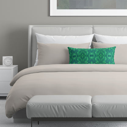 Neutral colored bedroom featuring a bed with an green abstract patterned lumbar pillow.