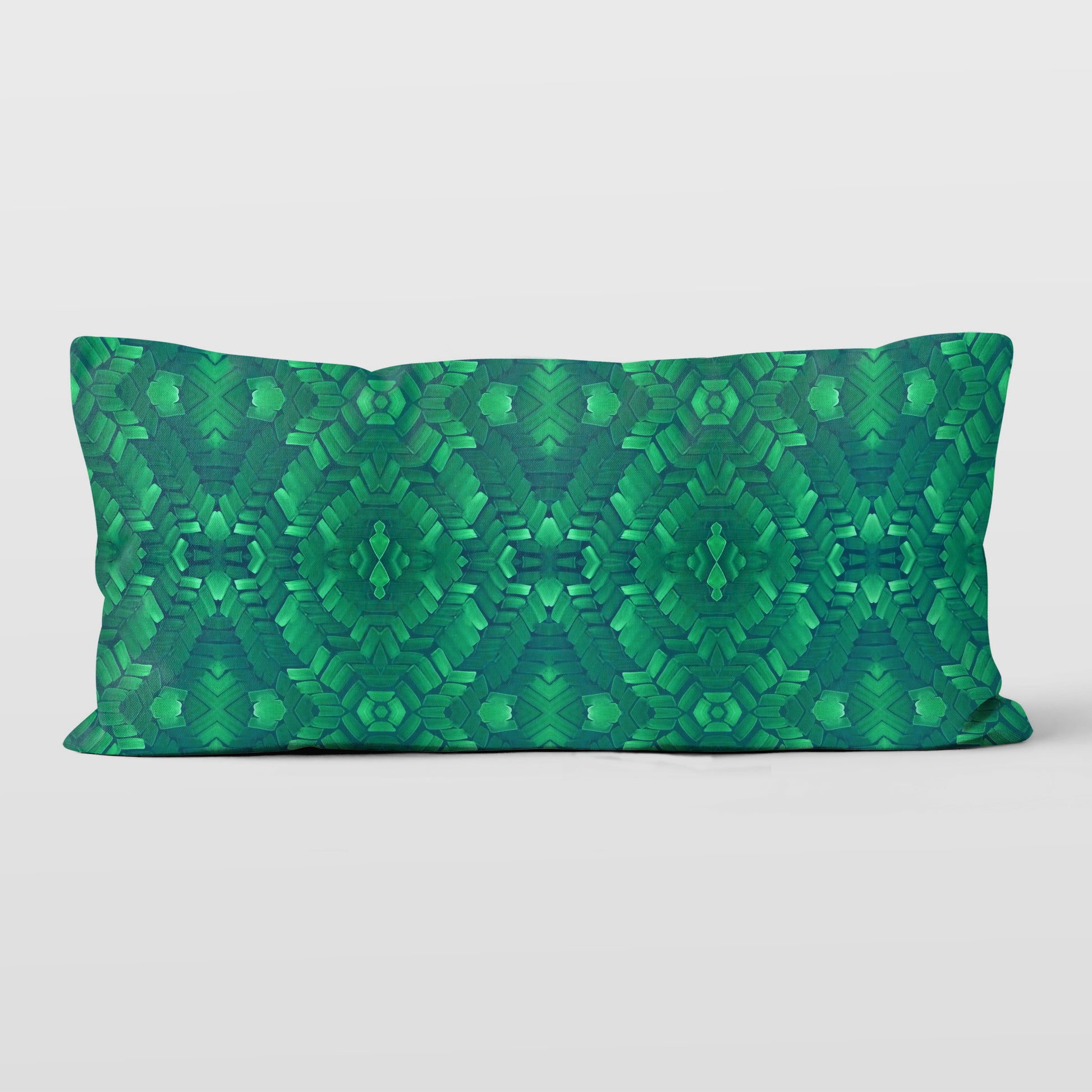 Rectangular lumbar pillow featuring a hand-painted abstract pattern in bright green.