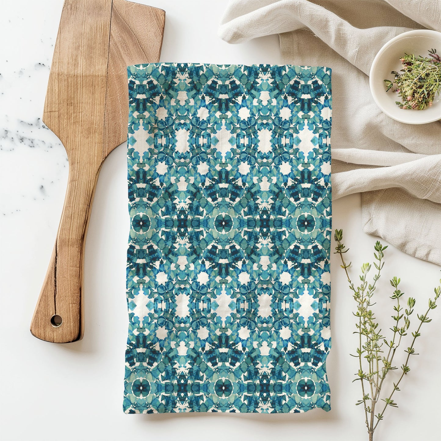 Flour sack tea towel featuring an abstract teal hand-painted pattern