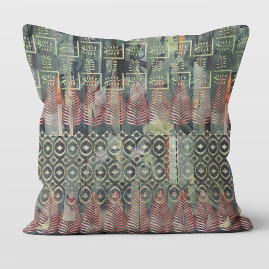 Square throw pillow featuring a green and red Indian block print pattern