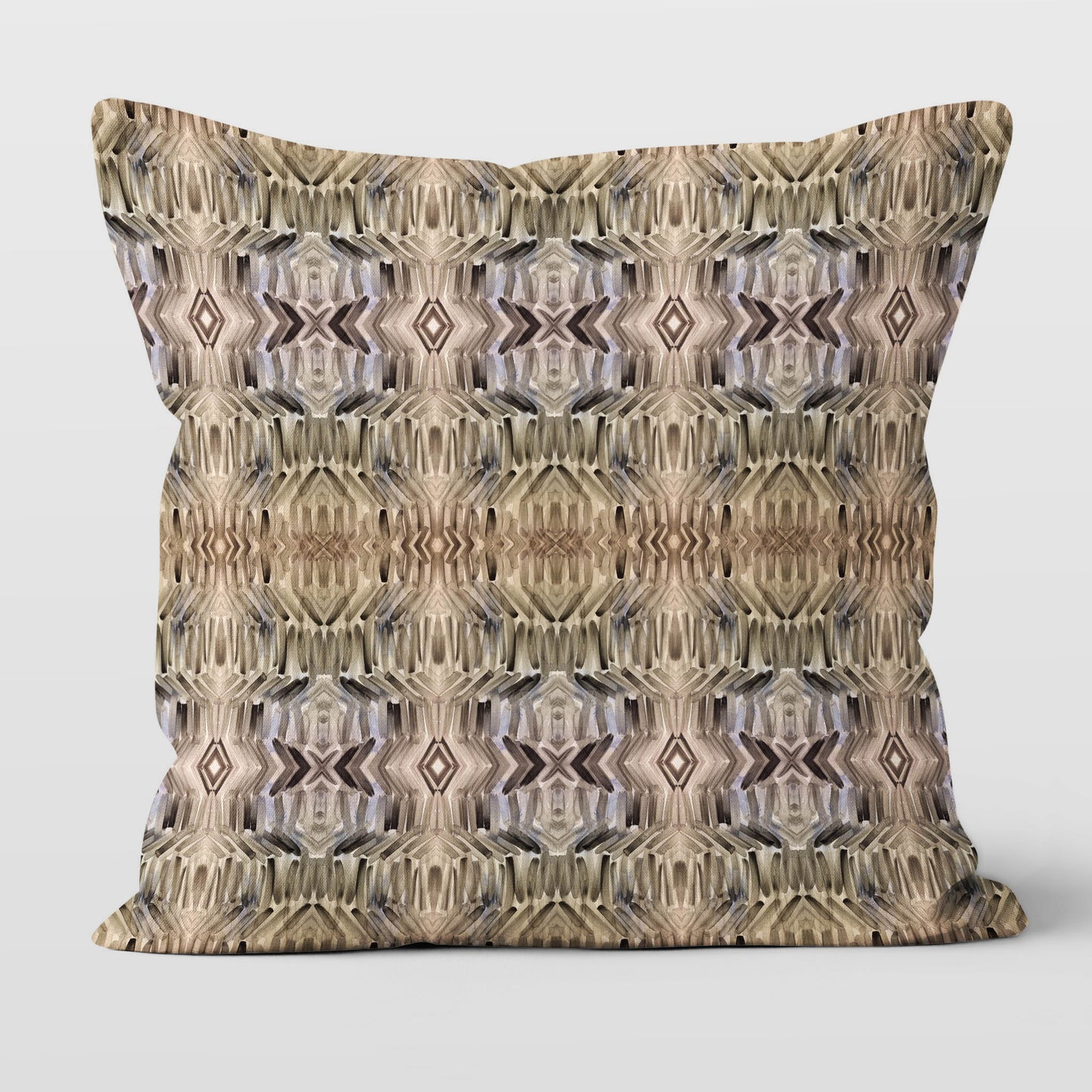 Pillow featuring abstract hand-painted pattern in neutral tones