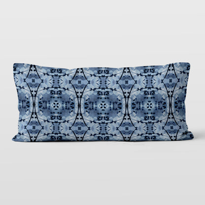 Rectangular lumbar pillow featuring an abstract hand-painted pattern in blue and black India Ink.