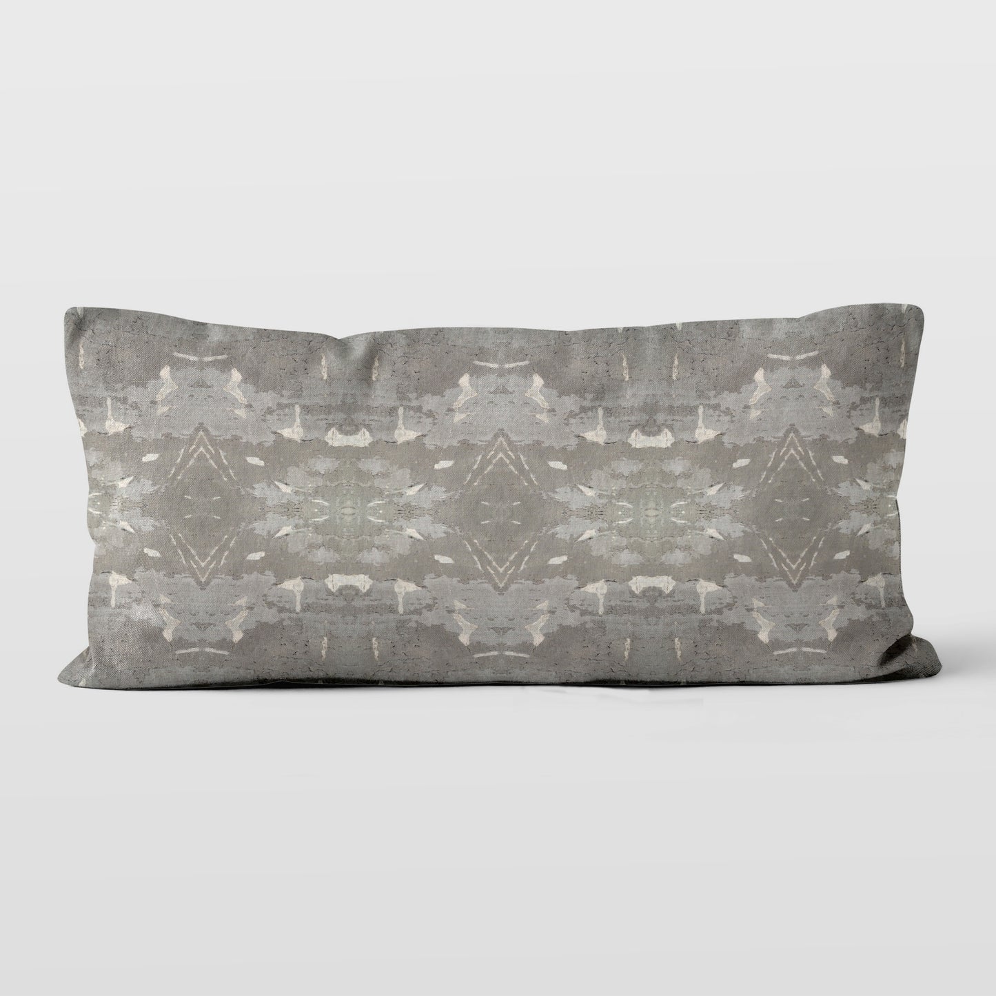 Lumbar pillow featuring a grey abstract geometric pattern