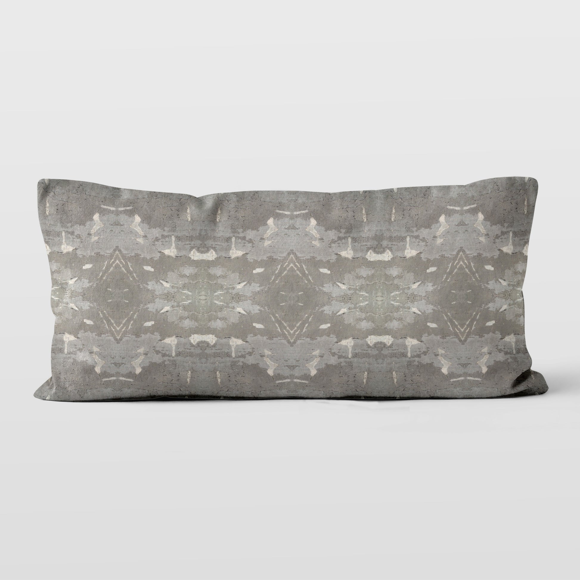 Lumbar pillow featuring a grey abstract geometric pattern