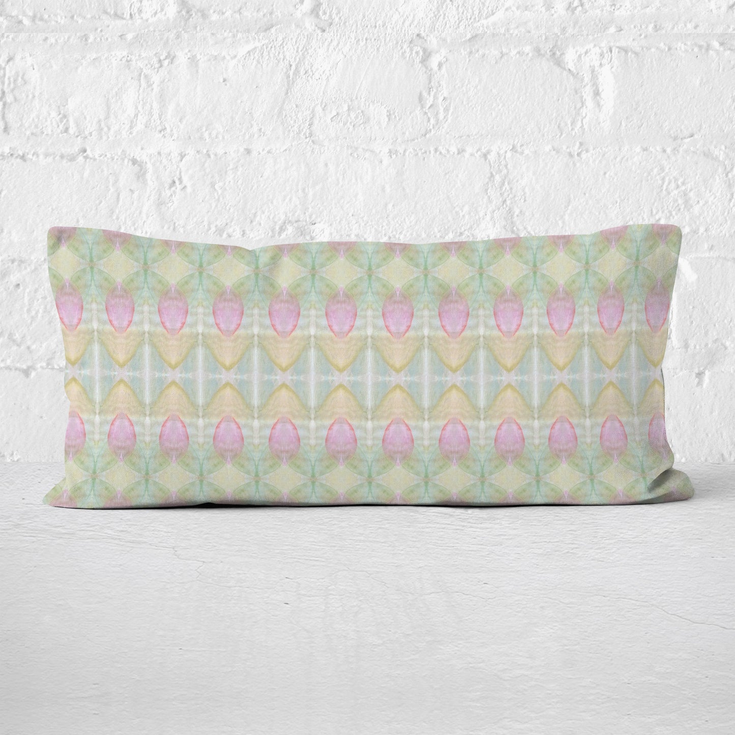 rectangular pillow featuring a hand-painted abstract rosebud pattern.