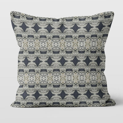 Square throw pillow featuring an abstract and ornate pattern in black and grey tones.