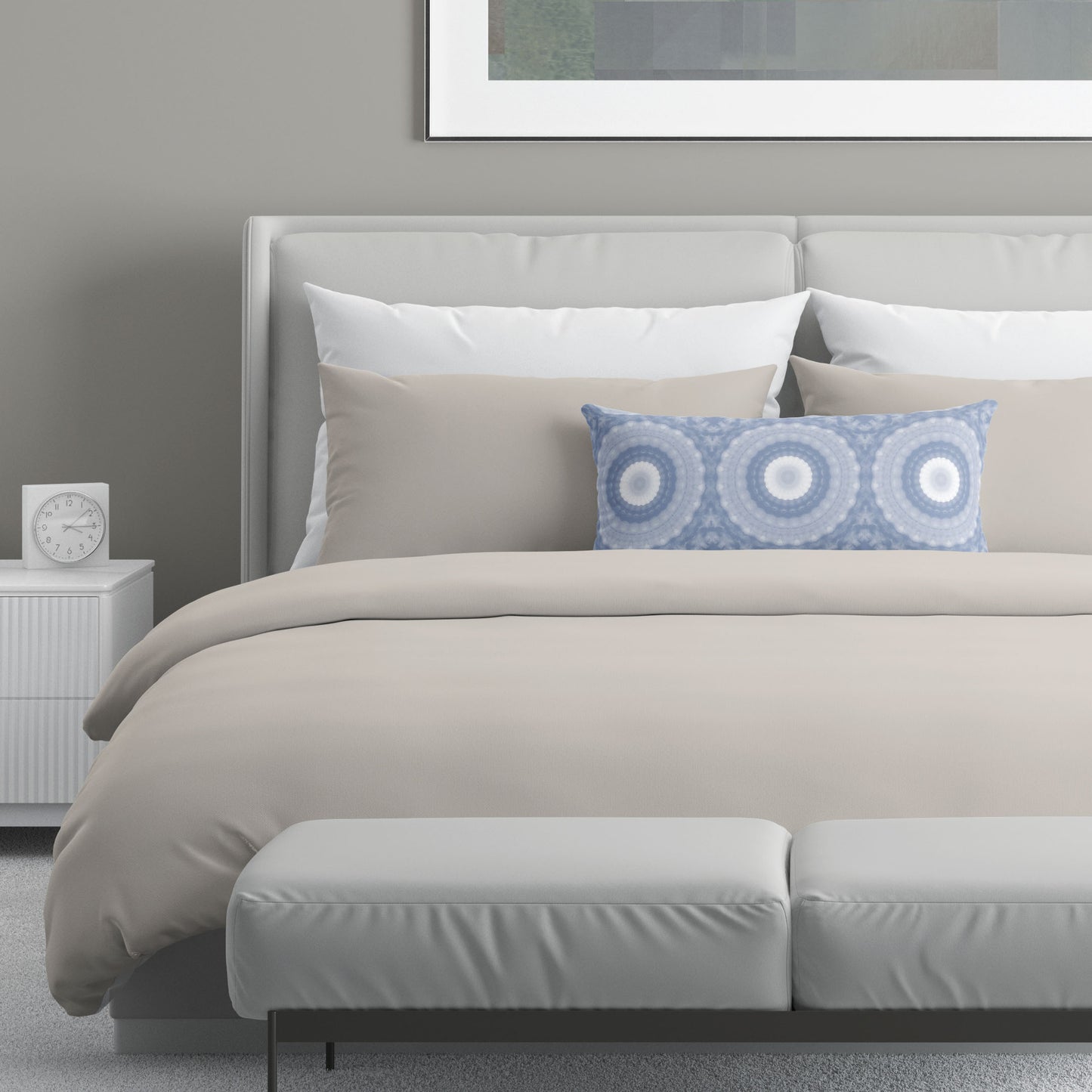 Neutral colored bedroom featuring a bed with a periwinkle abstract patterned lumbar pillow.